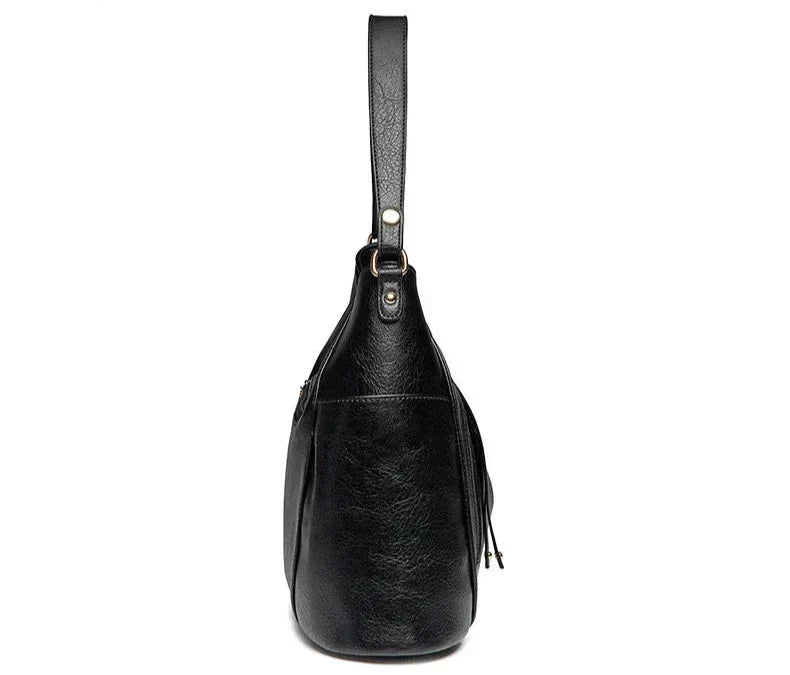 Wendy™ | Bolsa de Cuero con Flecos